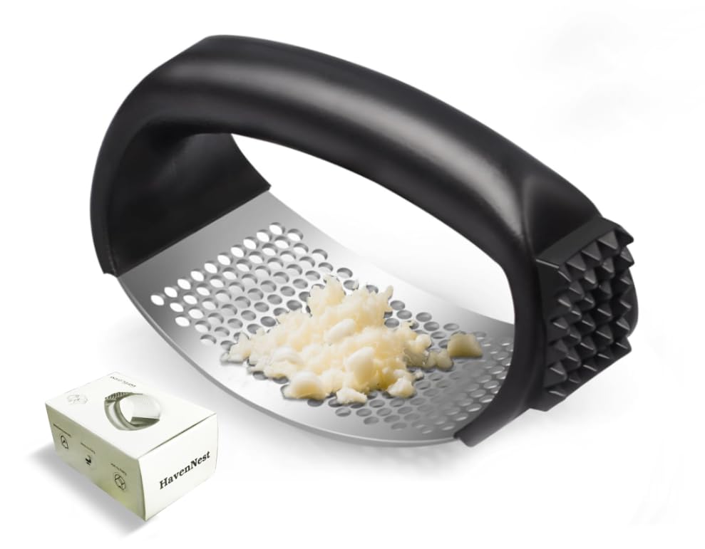 Anti-stick surface on HavenNest garlic press aids quick cleanup.