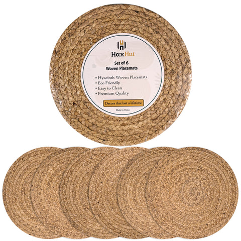 HaxHut round woven placemats on a dining table highlighting natural texture and surface protection