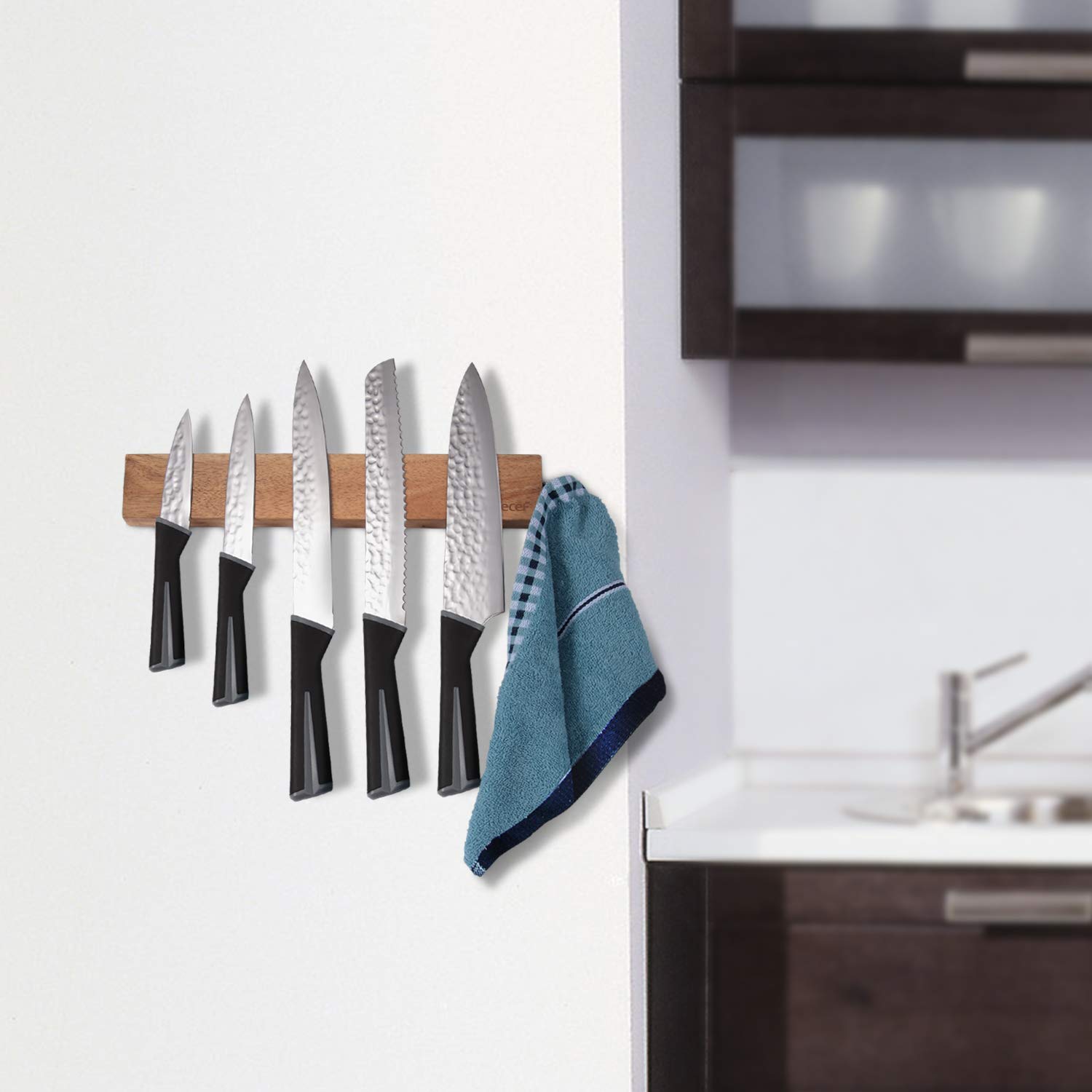 Hecef acacia wood knife strip on wall, kid-friendly design reduces clutter.