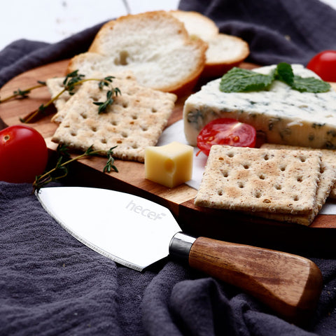 The hecef board set contents include board, marble panel, and knife.