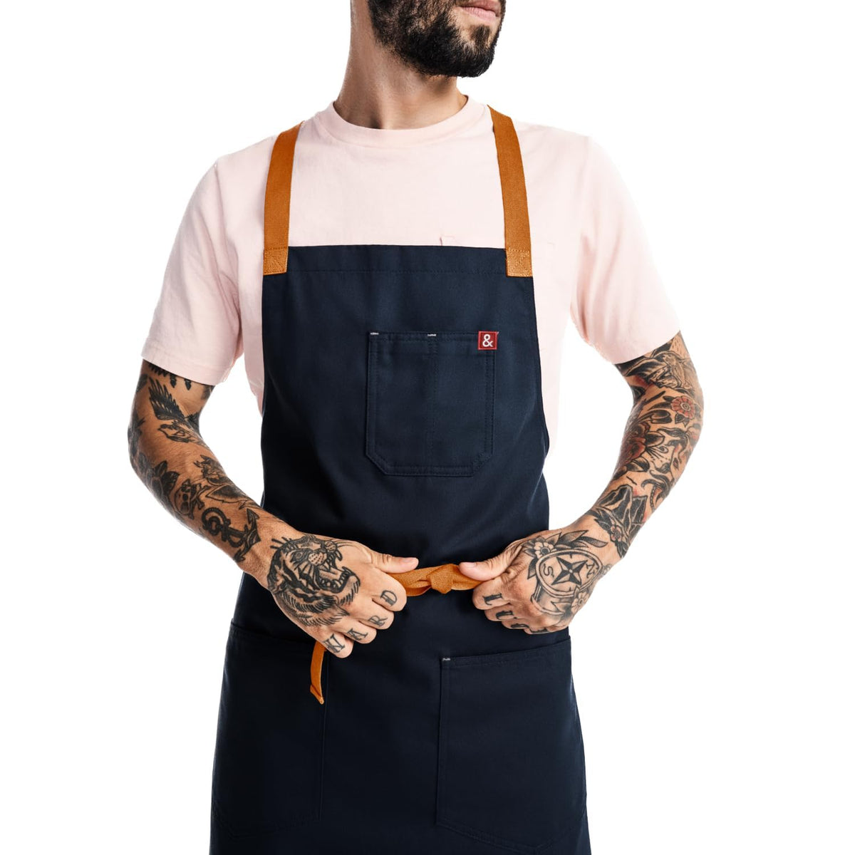 Hedley & Bennett Crossback Apron with crossback straps supports comfort during long kitchen shifts.