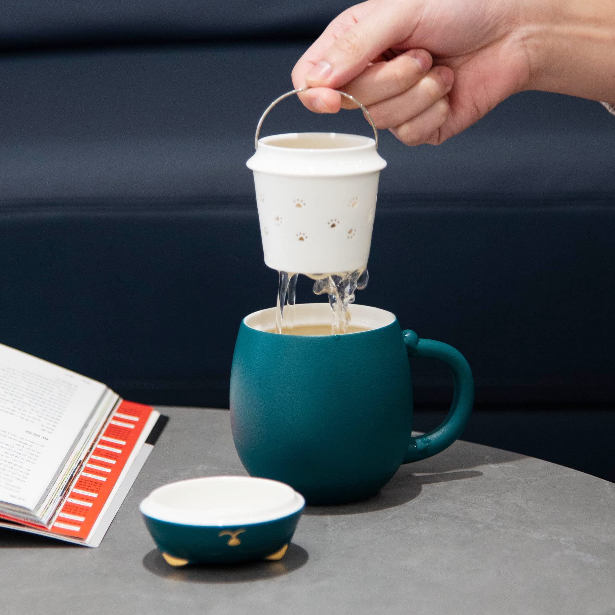 Ceramic tea strainer with paw shaped holes preserves flavor