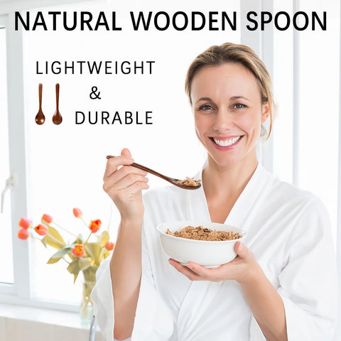 Hefild wooden spoon for honey drizzling beside tea, highlighting culinary versatility