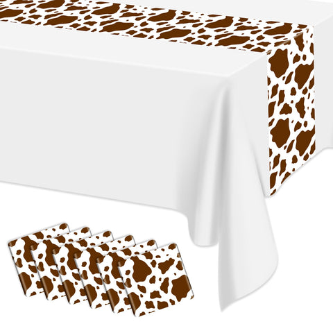 Hegbolke brown cow print table runner pack on rustic table, ideal for parties.