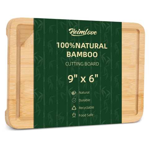 Heimlove mini bamboo cutting board with juice groove for mess-free prep.