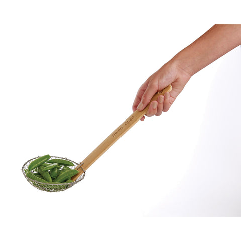 Helen's Asian Kitchen Spider Strainer drains hot oil safely from a frying pot.