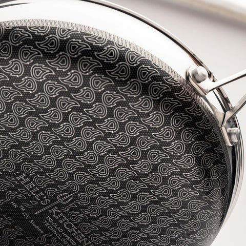 Hell's Kitchen Hybrid 11in fry pan durable surface withstands metal utensils.