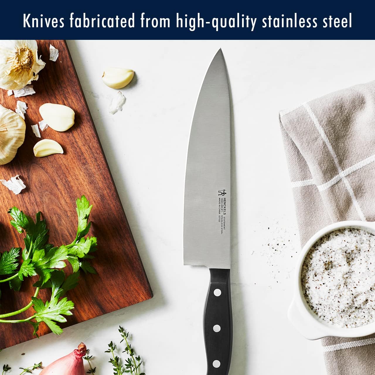henckels 7-inch hollow-edge santoku demonstrates grantons reduce sticking