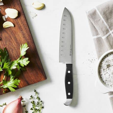 Henckels 7-inch santoku hollow edge ready for precise slicing and mincing