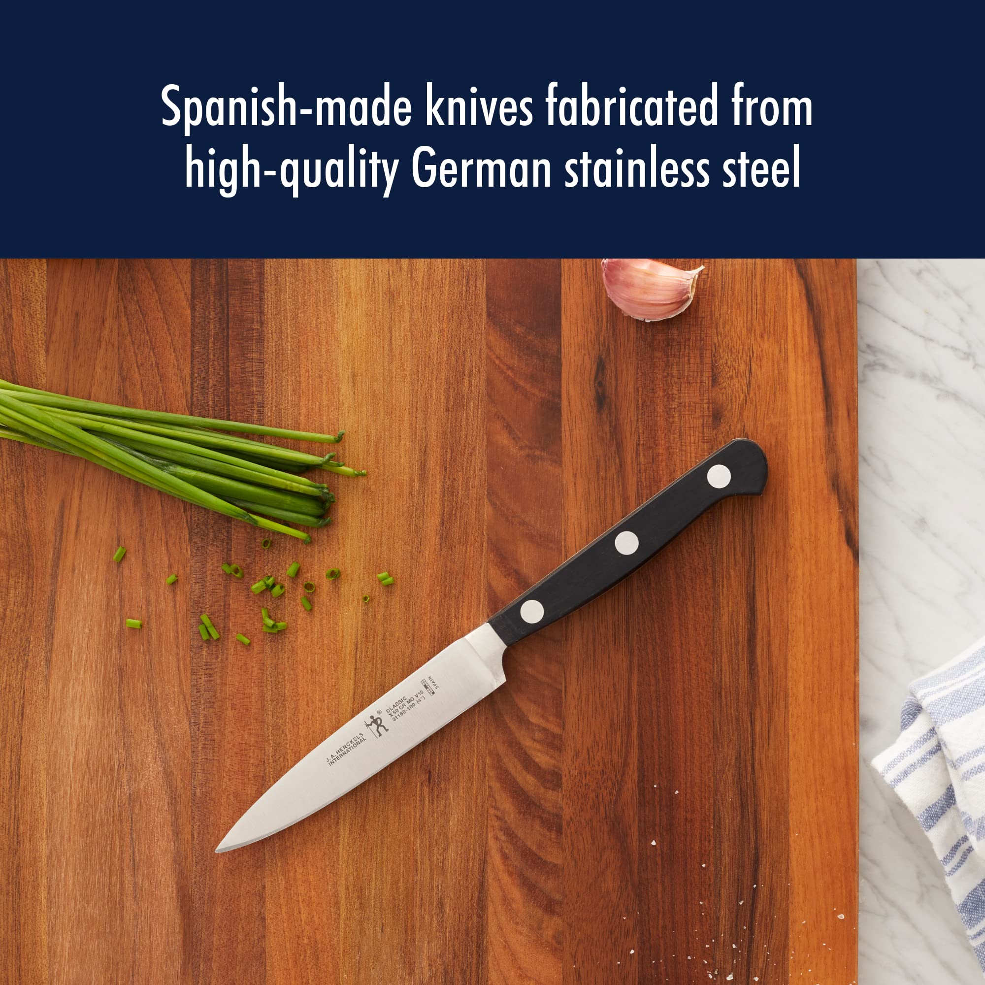 HENCKELS Classic 4-inch Paring Knife blade for peeling and detail work.