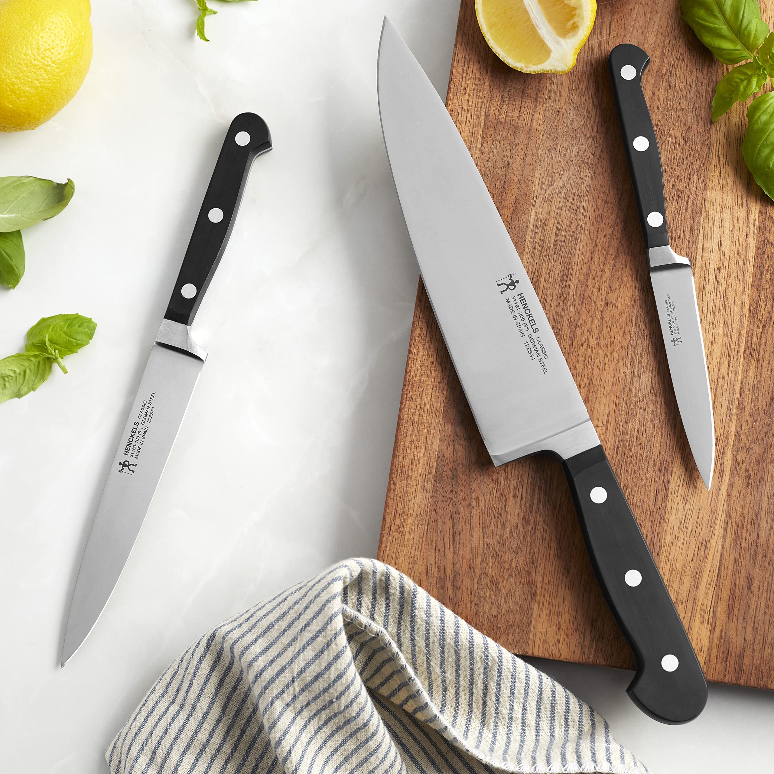 HENCKELS Classic ergonomic balance enhances precision during extended prep sessions.