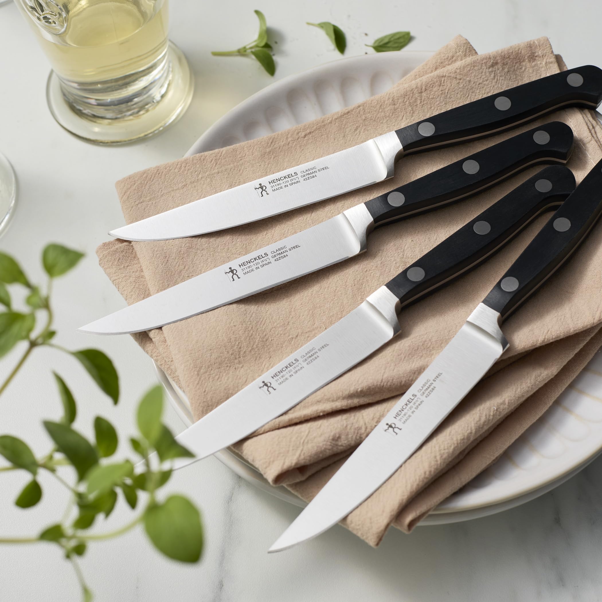 Henckels Classic fully forged construction provides balanced cutting.