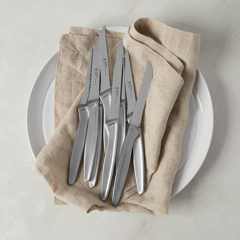 Henckels dishwasher-safe stainless steel knives designed for easy cleanup.