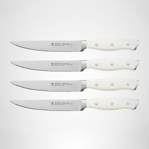 Henckels Forged Accent 4-piece steak knife set ready for dining.