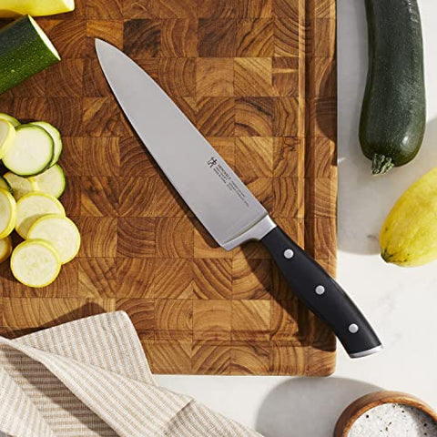 Henckels Forged Accent 8-inch Knife ergonomic handle for comfortable prep.