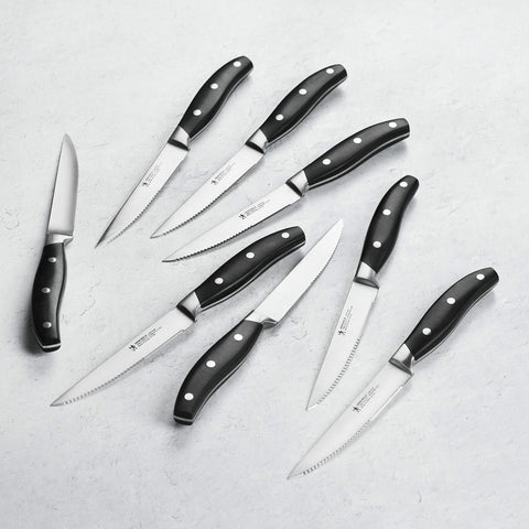 Henckels Forged Contour blade close-up, showcasing precision cutting and edge retention.