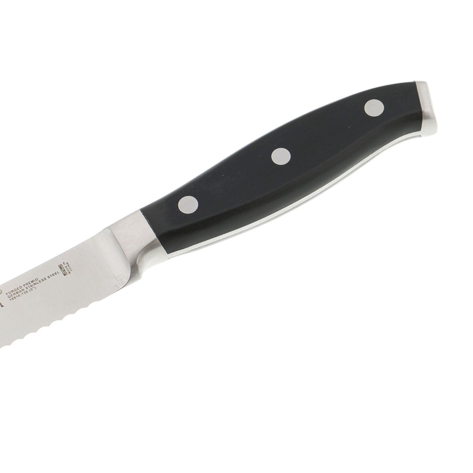 HENCKELS Forged Premio 5in serrated knife slicing tomato and cheese with ease
