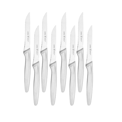 Henckels razor-sharp steak knives close-up showing precision blades for clean cuts.