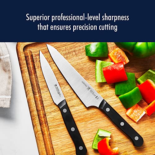 Henckels Solution 4-inch paring knife ideal for peeling and trimming small fruits.