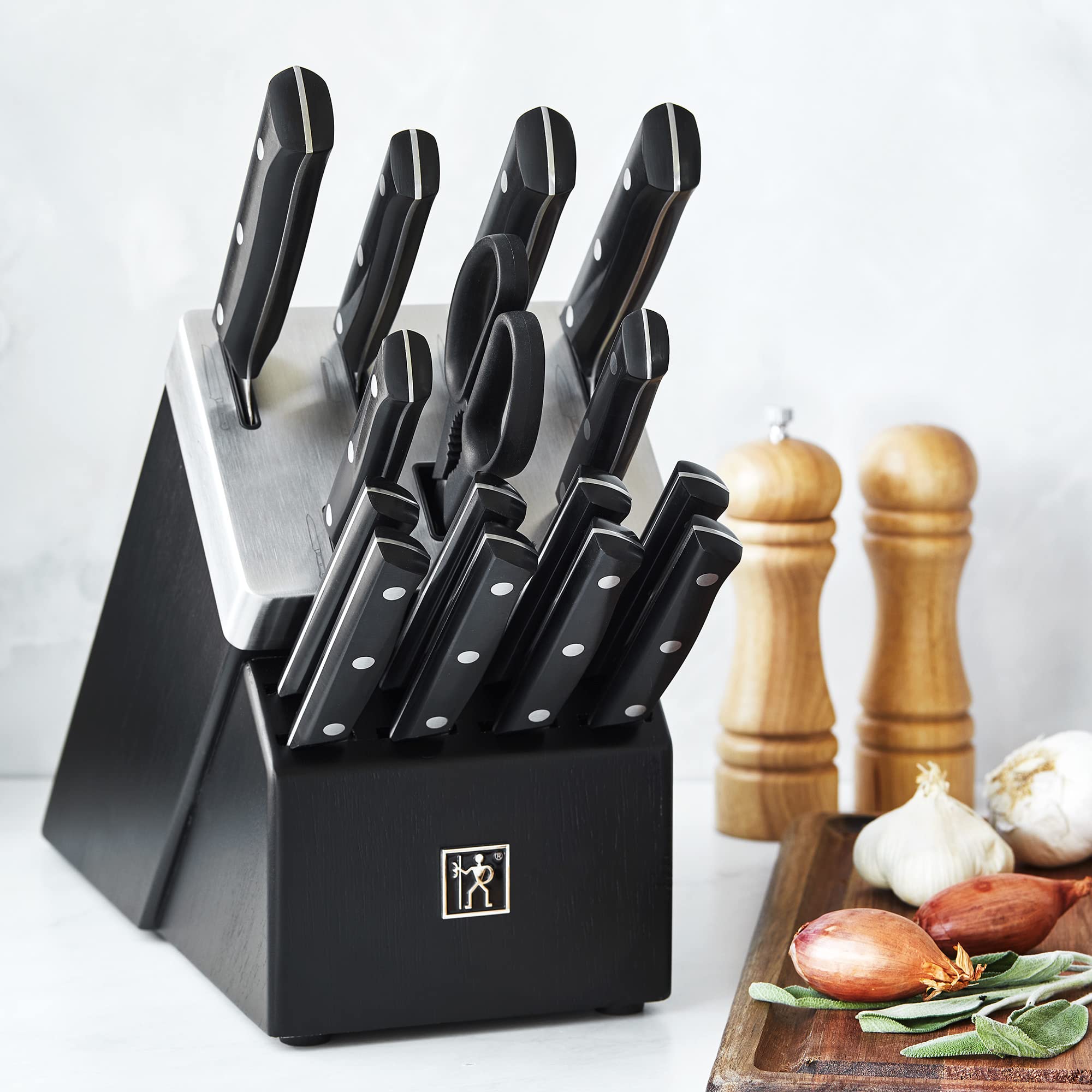 HENCKELS Solution 5.5-inch hollow-edge santoku for versatile prep.