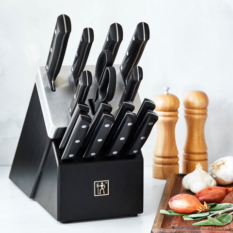 HENCKELS Solution 5.5-inch hollow-edge santoku for versatile prep.