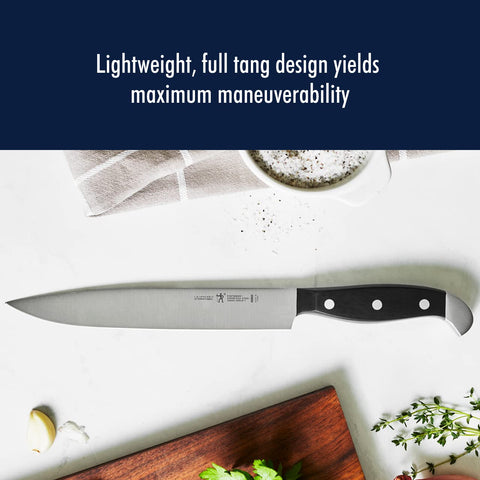 Henckels Statement 5-inch serrated utility knife for versatile kitchen work.