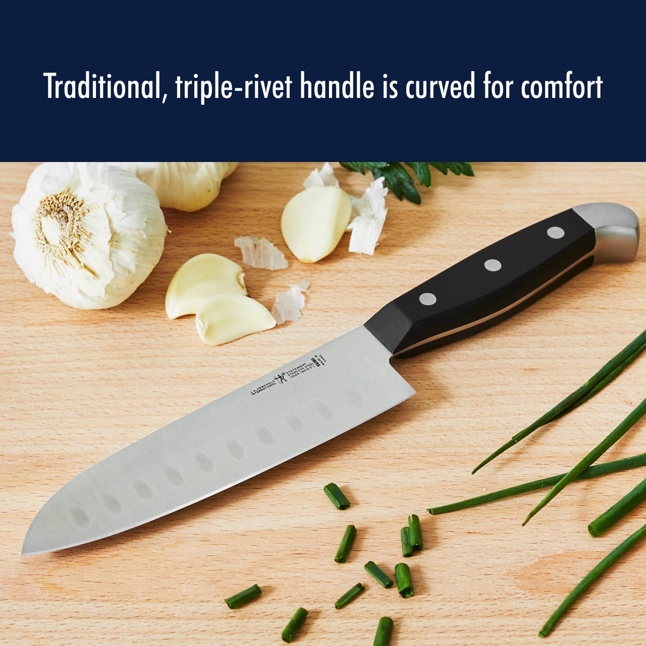 Henckels Statement 6-inch utility knife versatile for small prep tasks.