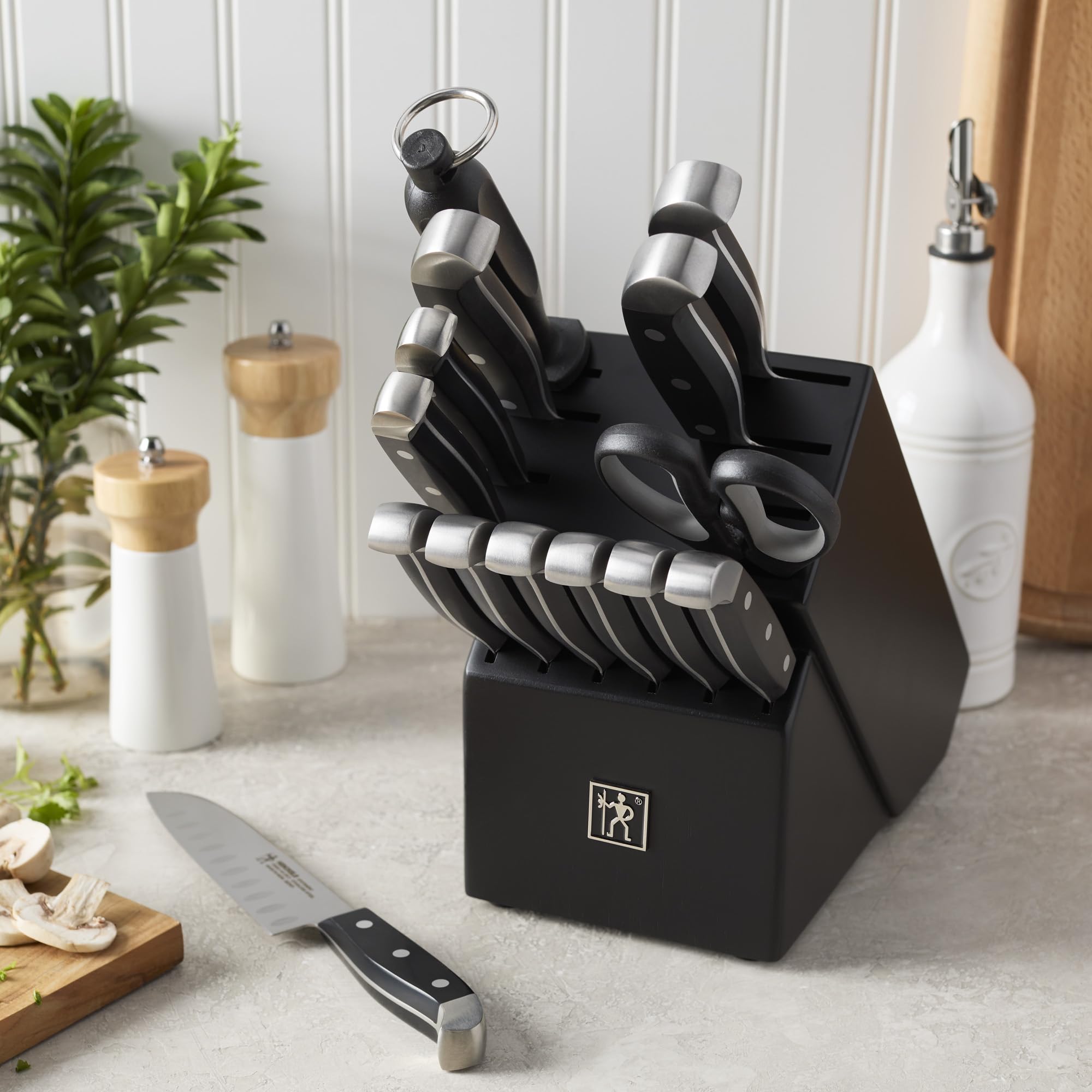 Henckels Statement 7-inch hollow-edge santoku with grantons for smooth slicing