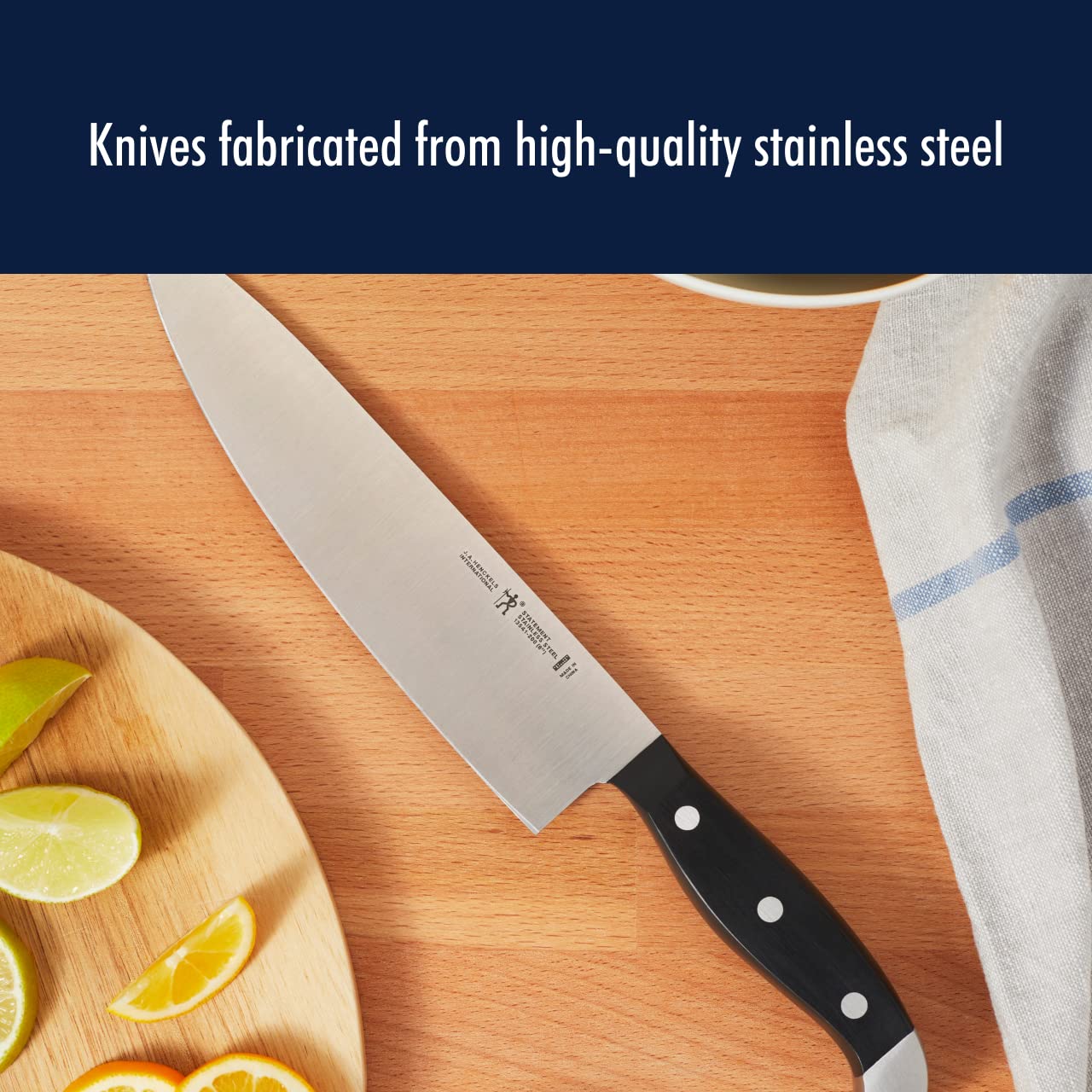 Henckels Statement 7-inch santoku for efficient mincing and delicate slicing.