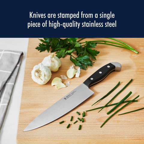 Henckels Statement 7-inch santoku with grantons for smooth, sticking-free slicing.