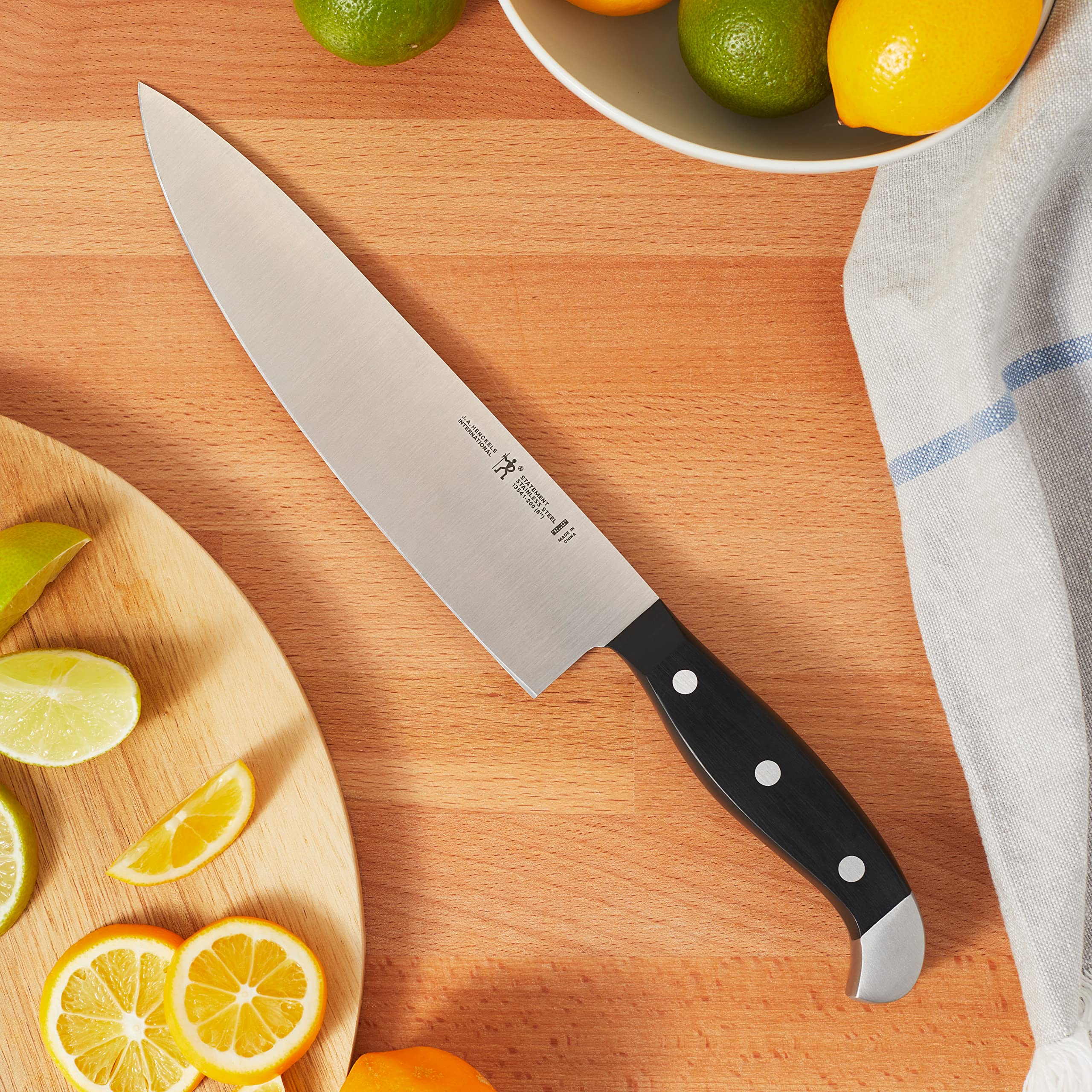 Henckels Statement 8-inch bread knife delivering clean crust-cutting for crusty loaves.