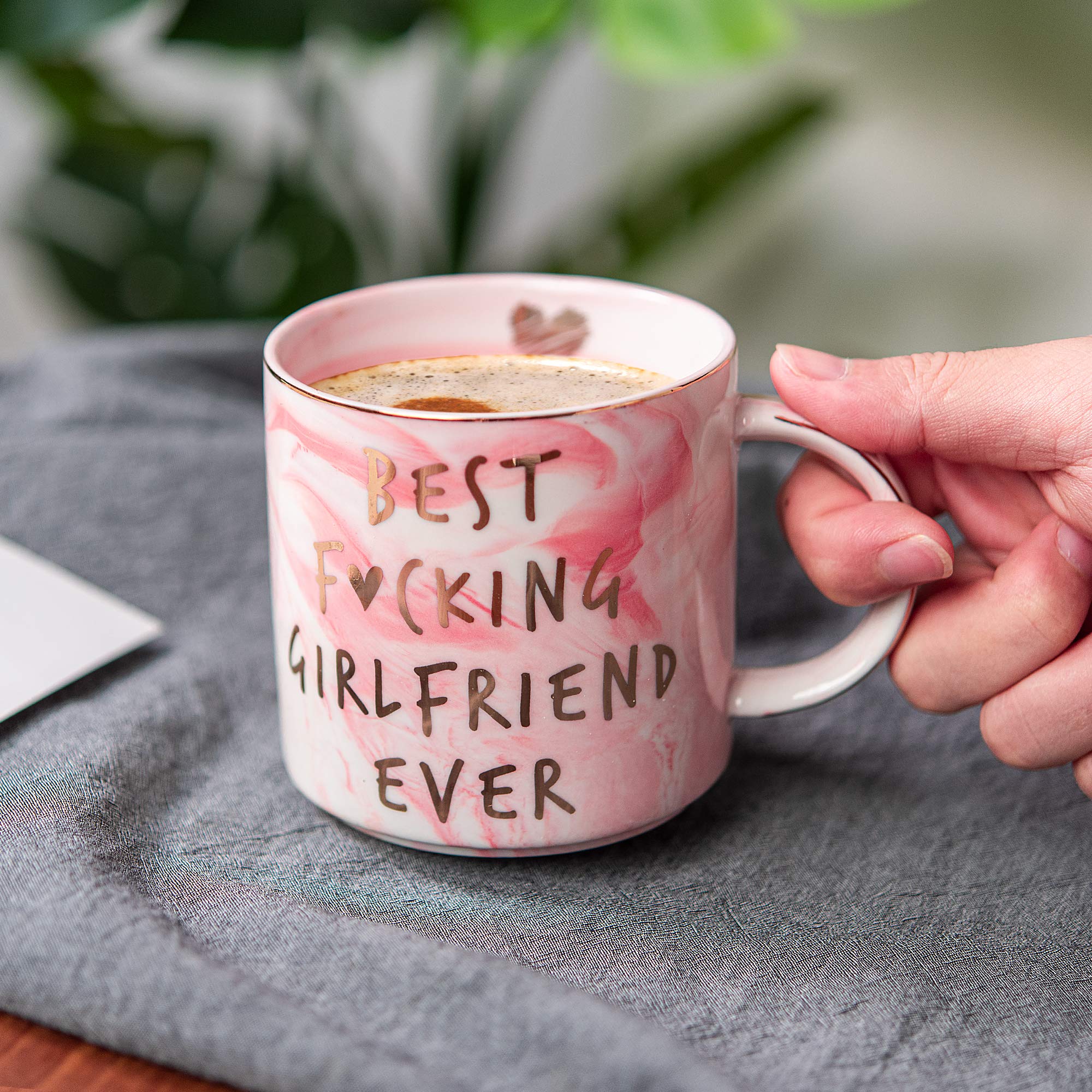 Hendson pink mug close-up inner lip heart detail for luxury feel.