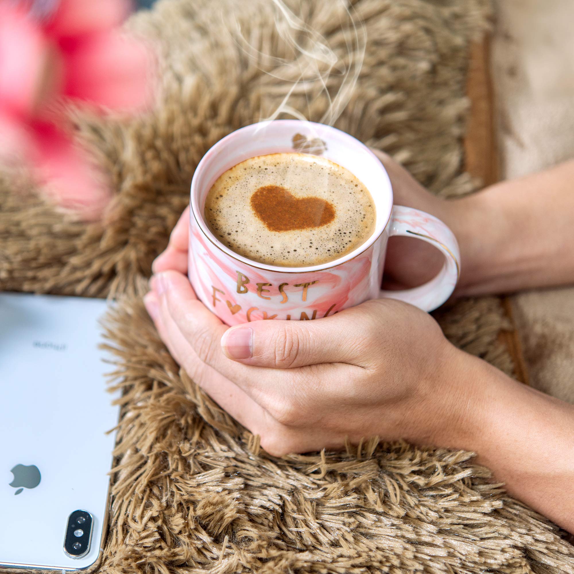 Hendson pink mug on pink background with steam for cozy mornings.