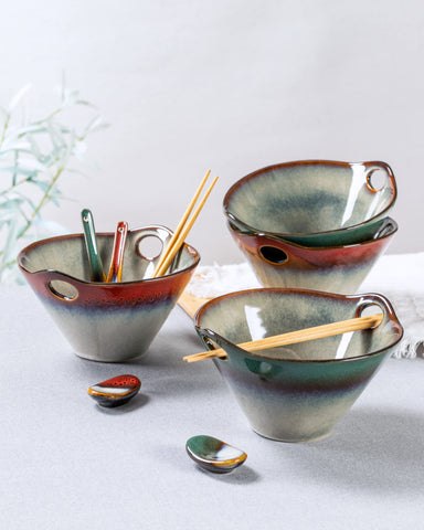 Henxfen Lead bowls with spoons and rests on table, ideal for sharing meals.