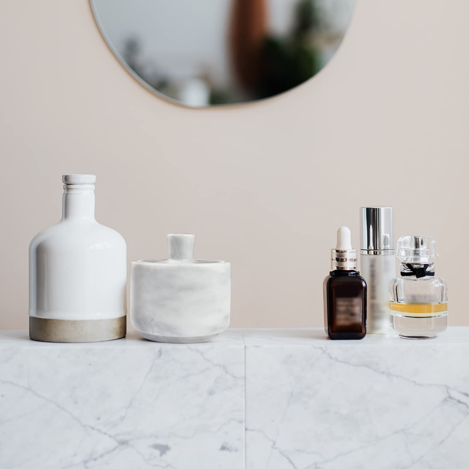HESHIBI marble salt cellar on kitchen shelf for easy access.