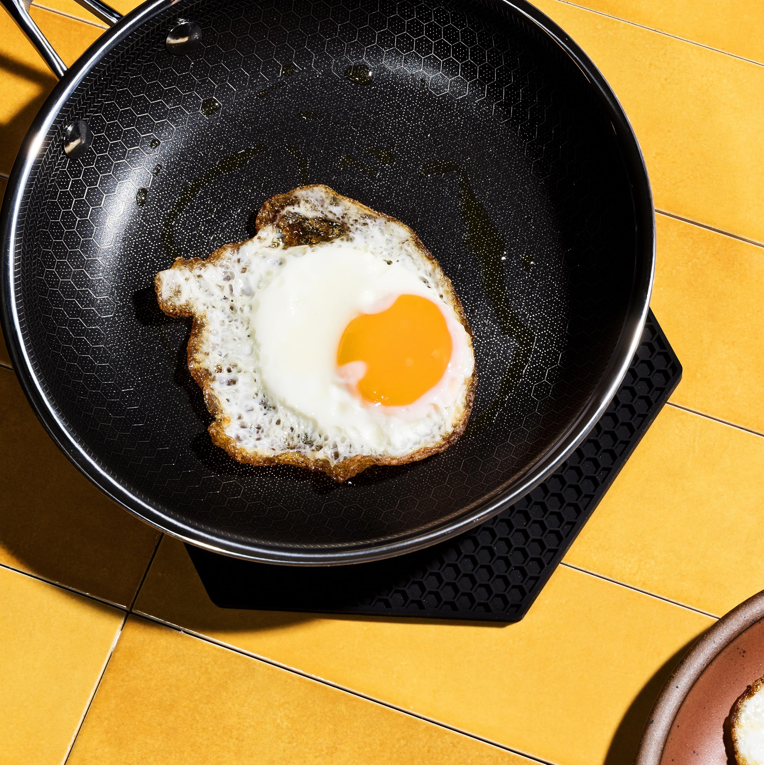 HexClad hexagon silicone trivet cleaning benefits quick wipe-down after cooking