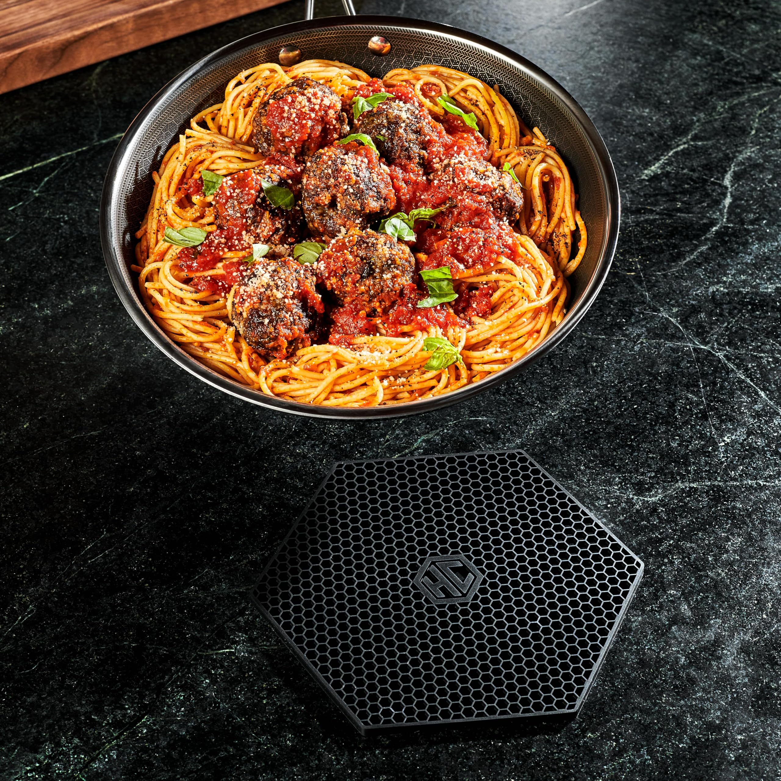 HexClad hexagon silicone trivet size reference measures approximately eight by seven inches