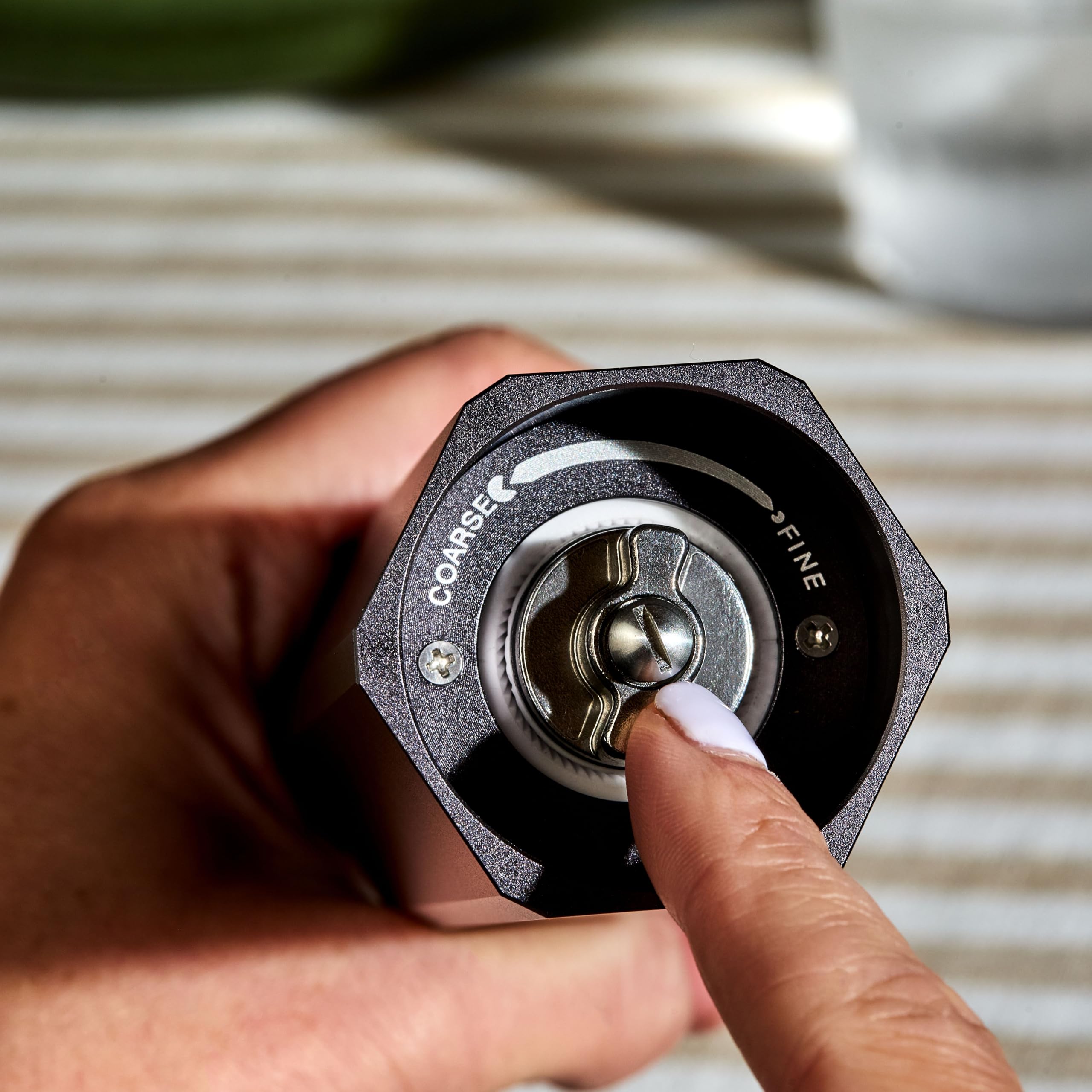 HexClad HexMill quick-release cap for easy, mess-free refilling.