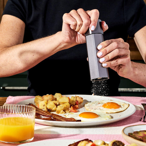 HexClad HexMill stand keeping grinders organized on the table.