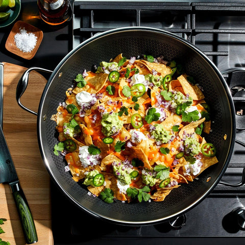HexClad 14-inch wok interior shows hexagonal nonstick texture ideal for flip-and-stir recipes