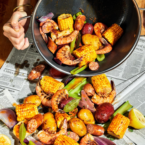 HexClad stay-cool handles keep hands comfortable during cooking.