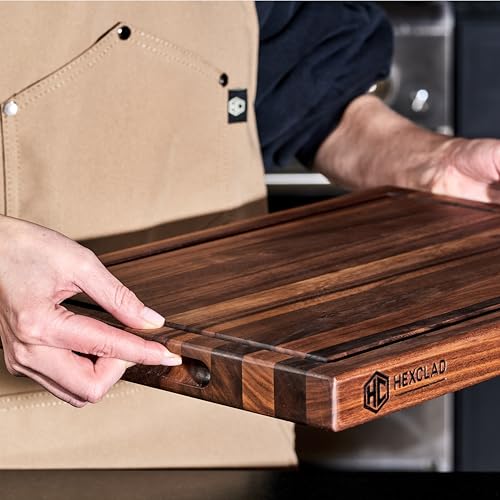 Recessed handles on HexClad walnut board for easy lifting