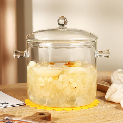 HHMJSM glass pot on stove showing see-through design during simmering