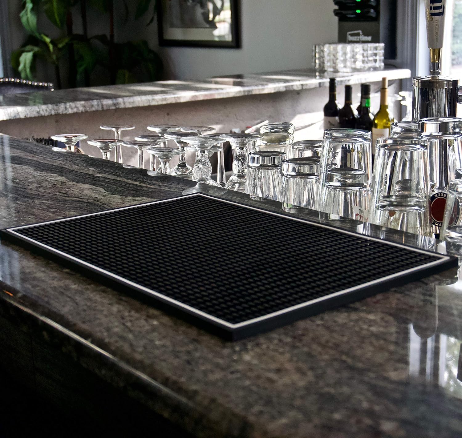 Highball and Chaser bar mat demonstrates spill containment on countertops