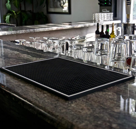 Highball and Chaser bar mat demonstrates spill containment on countertops