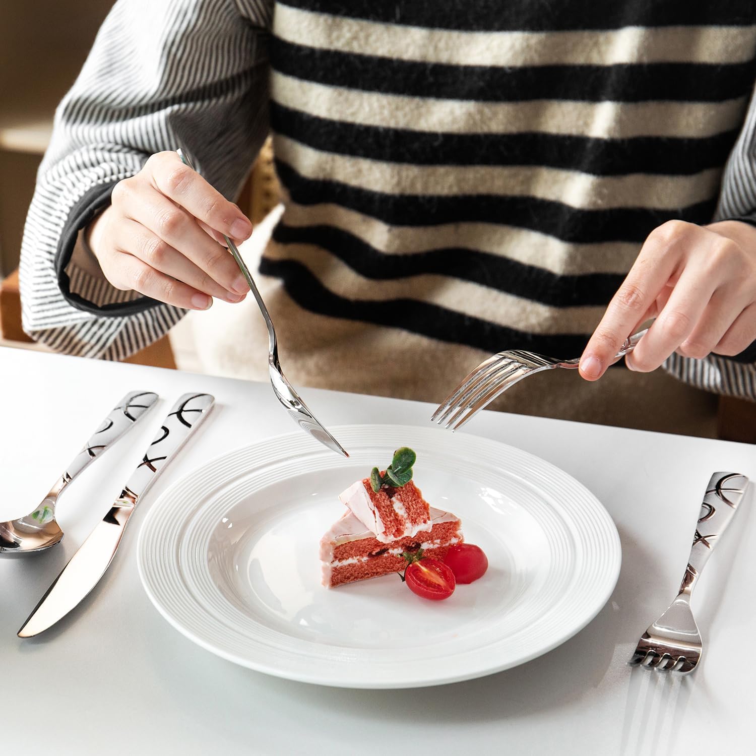 HIKAA 40-piece silverware set with ergonomic handles for comfortable daily use.