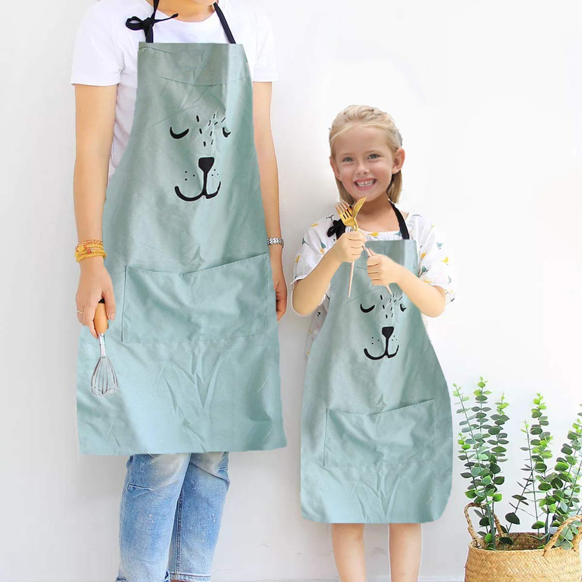 Hillhome family kitchen scene with coordinated aprons