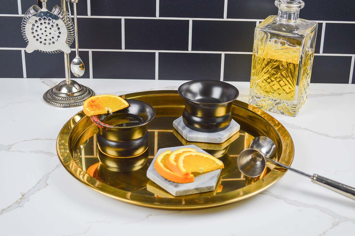 Historically Modern Oaxaca glass, angle 2 view, ergonomic stemless form great for comfortable sipping.
