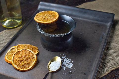 Historically Modern Oaxaca glass closeup rim highlight smooth edge for clean tasting experience.
