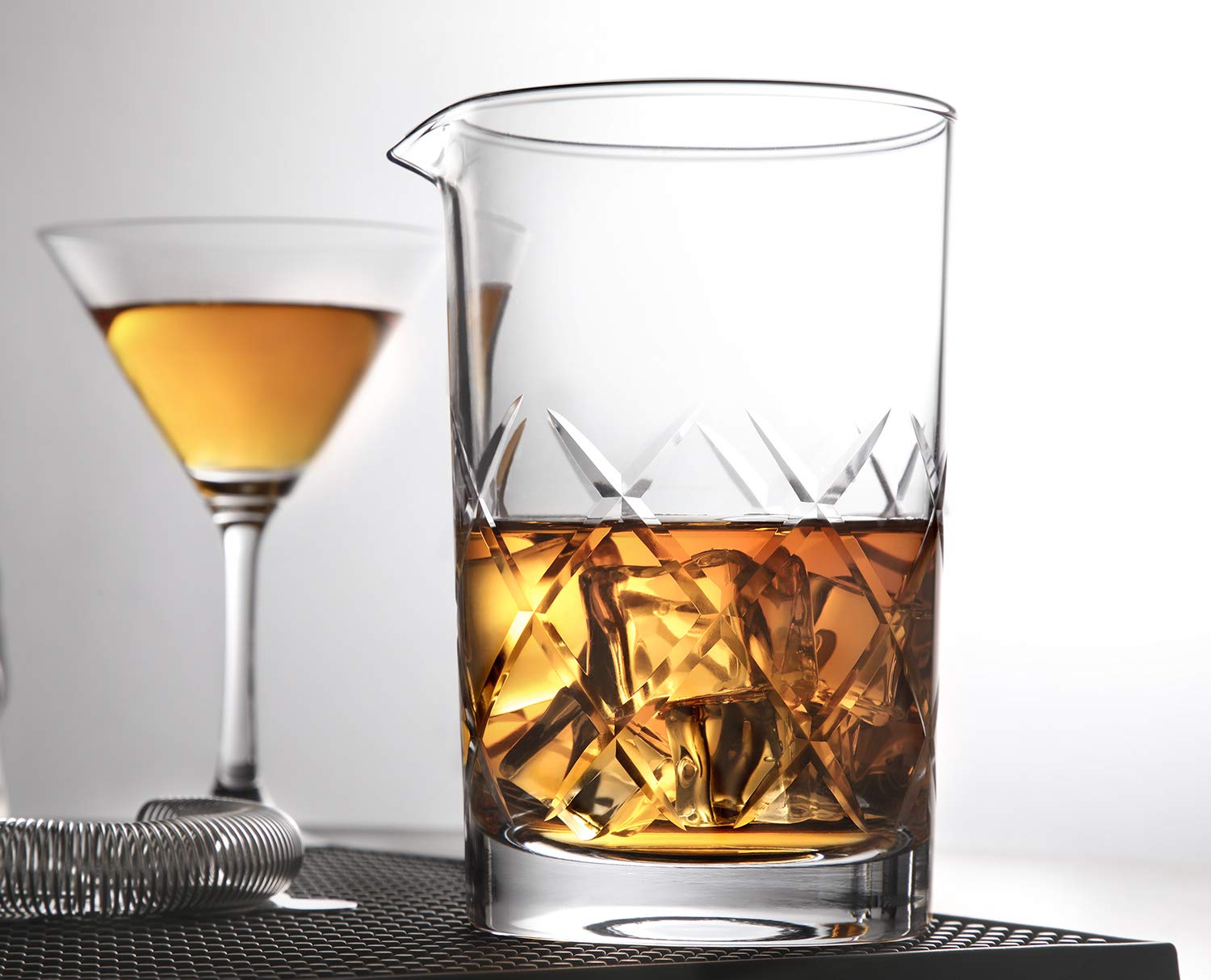 HIWARE mixing glass pairs with standard bar tools for efficient prep.